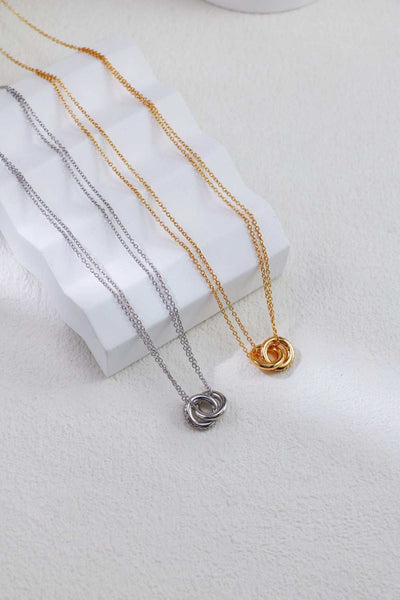 Handcrafted Double Ring Necklace showcasing two delicate rings with Zircon details