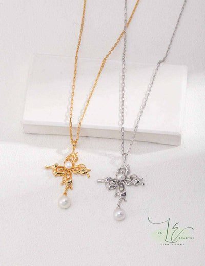 Elegant Butterfly Pendant Necklace with Pearl | 925 Silver & 18K Gold - delicate wing details framing a lustrous freshwater pearl.