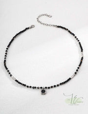 Close-up of Black Agate Necklace showcasing the stone's glossy finish and premium silver/gold beadwork.