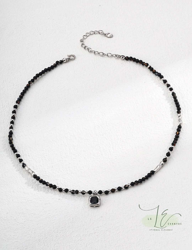 Close-up of Black Agate Necklace showcasing the stone's glossy finish and premium silver/gold beadwork.