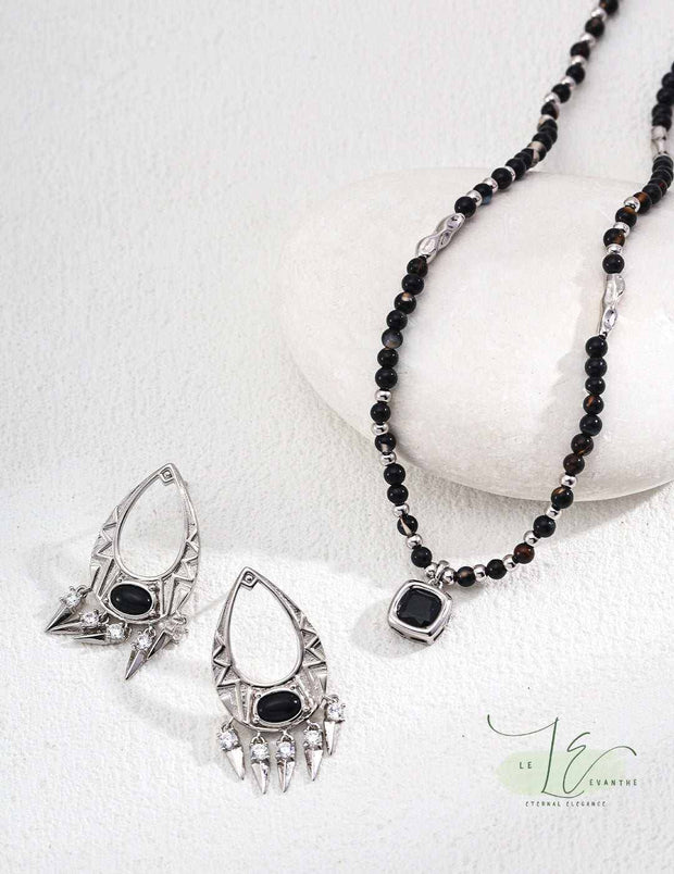 Model wearing the Black Agate Necklace, demonstrating its versatile 18-20" length for layering.