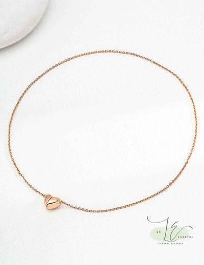 Elegant Minimalist Magnetic Heart Necklace | 18K Gold - featuring two seamlessly connecting heart pendants.