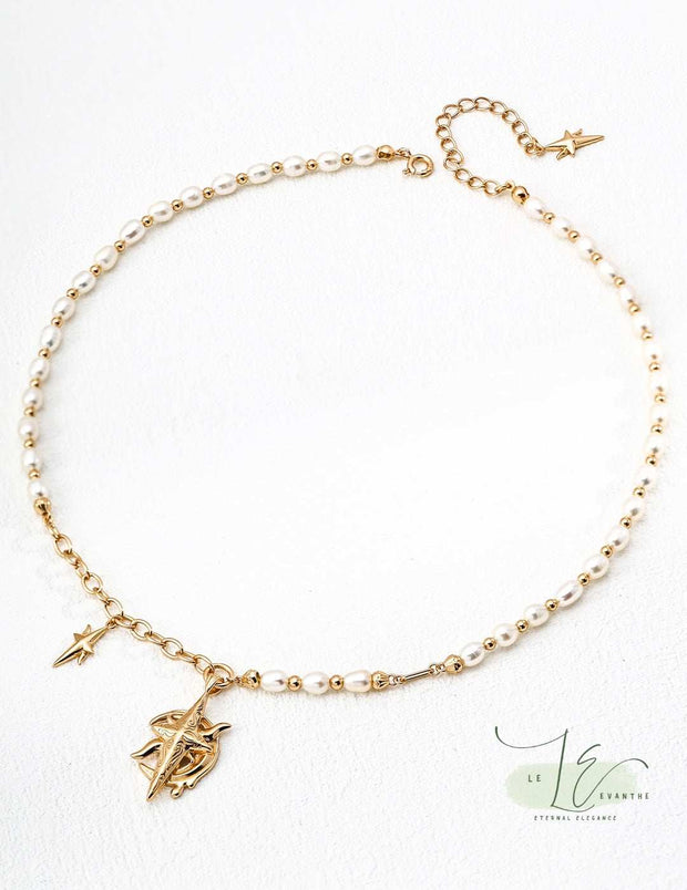 Elegant Moon Star Necklace in 925 Sterling Silver & 18K Gold – featuring a celestial-inspired pendant with a freshwater pearl, perfect for layering or standalone wear on its 18" adjustable chain.