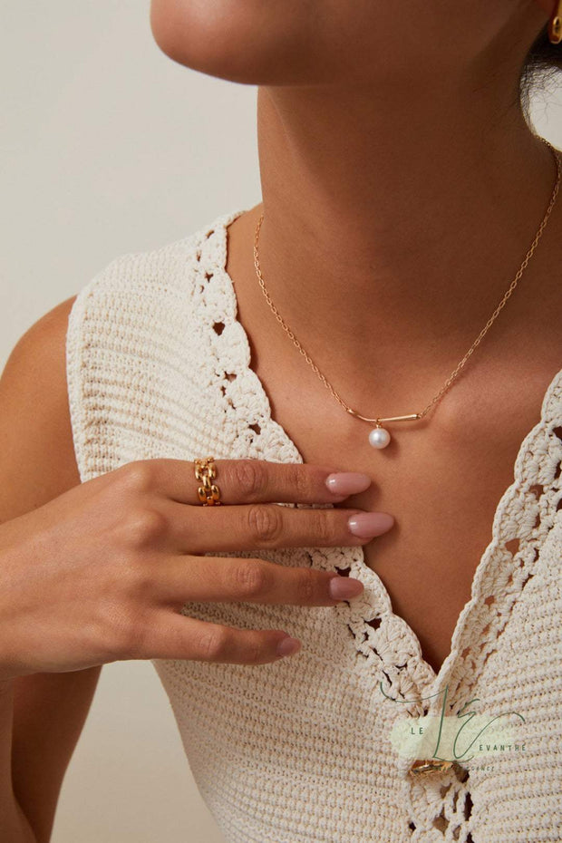 Side view of the Minimalist Pearl Pendant Necklace’s secure lobster clasp and adjustable chain, highlighting its hypoallergenic sterling silver construction for sensitive skin.