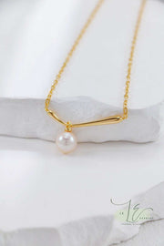 Luxury-packaged Minimalist Pearl Pendant Necklace in an eco-friendly gift box. Includes a polishing cloth to maintain the tarnish-resistant 18K Gold plating over sterling silver.
